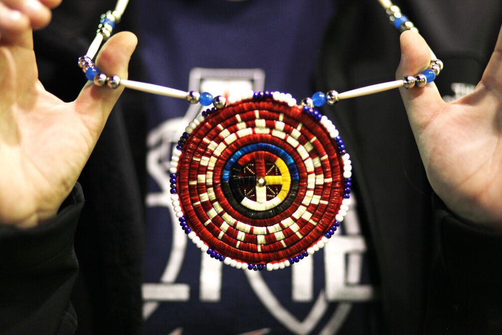 Hand made medallion beaded with porcupine quills.