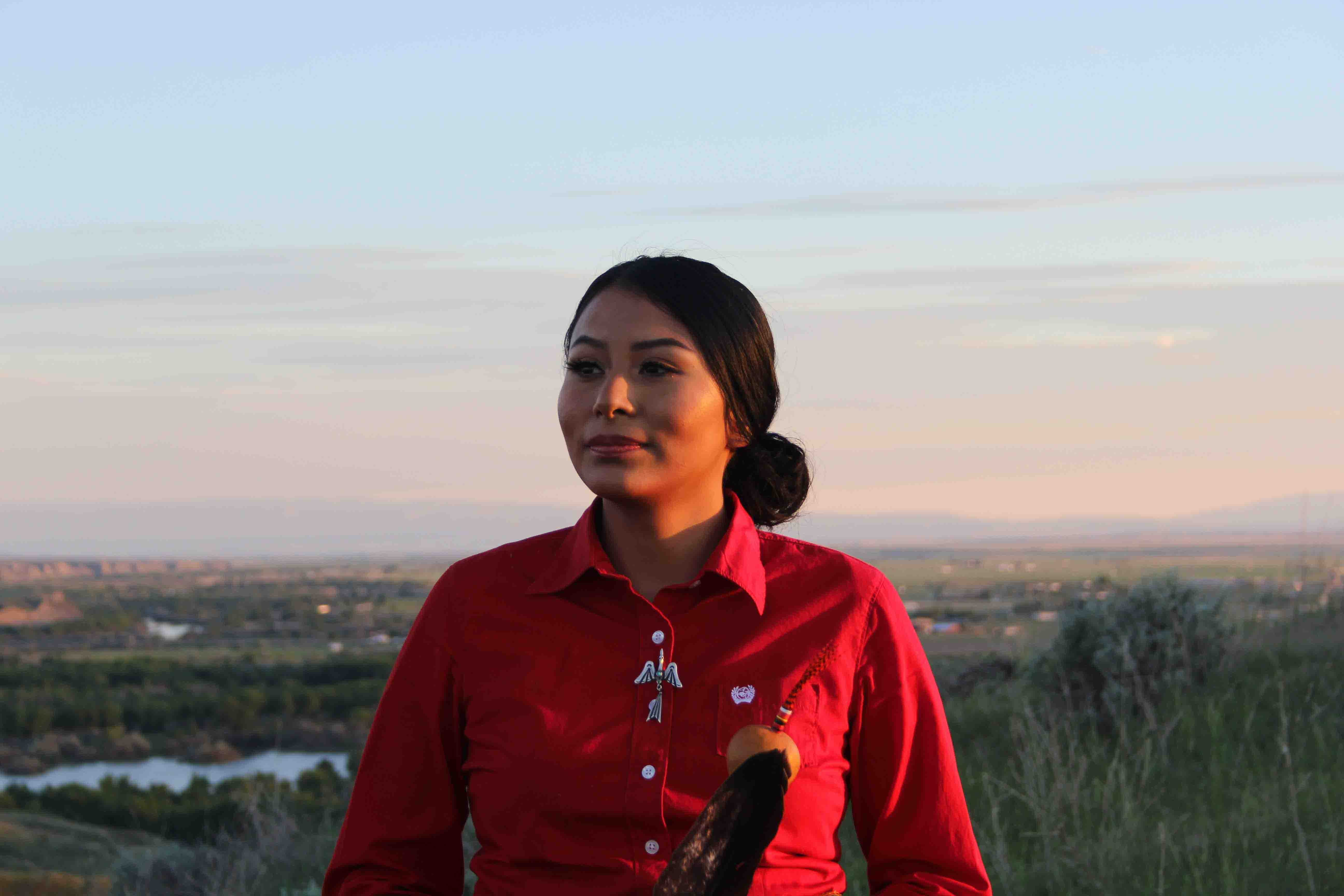 Deshawna Anderson, an American Indian College Fund scholar and business student at Little Big Horn College in Crow Agency, Montana. Deswahna designed The Courage to Bloom, which is available for purchase in Pendleton’s American Indian College Fund Blanket Collection
